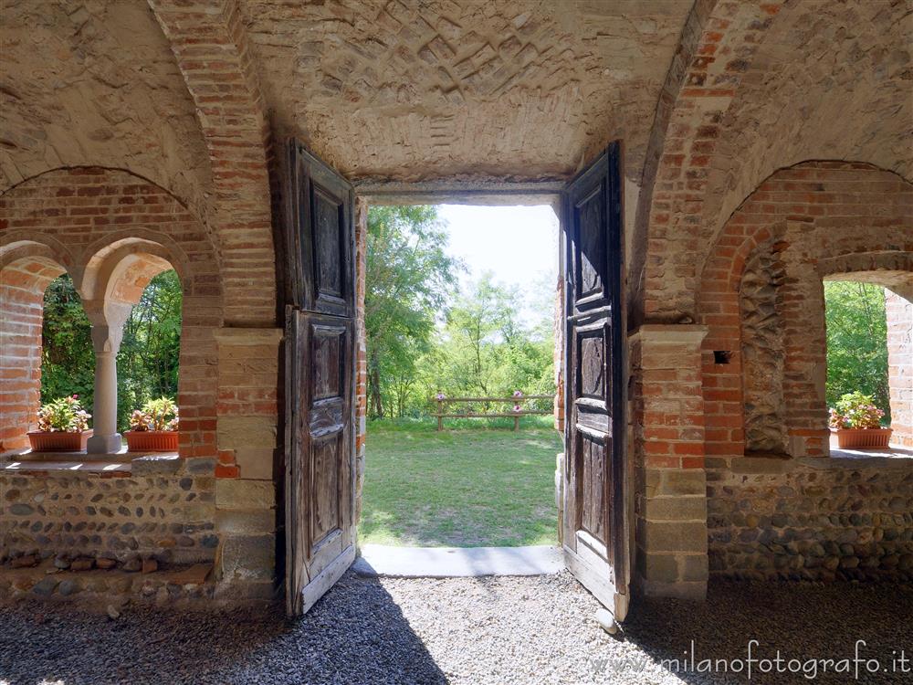 Castelletto Cervo (Biella, Italy) - View on the countryside from inside the portico of the church of the Cluniac Priory of the Saints Peter and Paul
